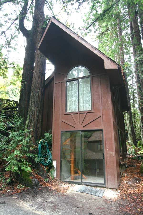 Both floors accessible from outside.  Inside, a spiral stair connects floors.