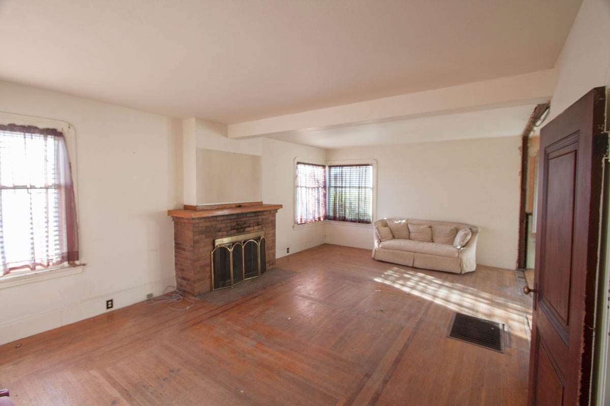 The living room is nicely sized at 15' x 25'.  The fireplace works well with a gas log option.  The house is heated with a single central furnace in the floor of the living room. 