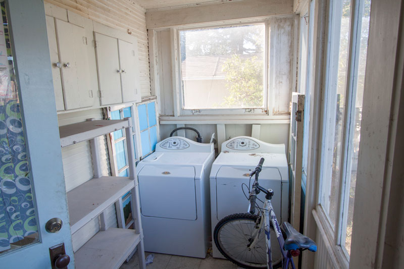 The laundry room is off the kitchen on the back.  An upright freezer is also included. 