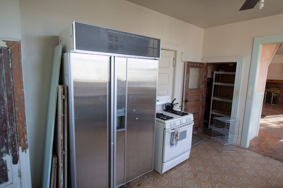 Here is an amazing high-end refrigerator, a gas stove and pantry.  The kitchen is 10.5 x 14'