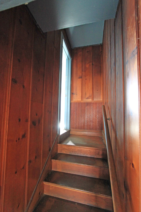 Up the stairs is the second bedroom.  Again some vintage pine.