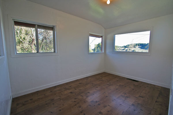 The third bedroom is small and is off the living room with great views.  It measures 7 x 11.