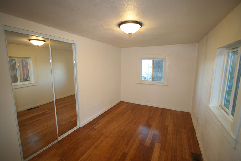 The second bedroom has a large closet and bamboo flooring. It measures 8 x 15.