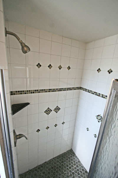 The shower is tiled.